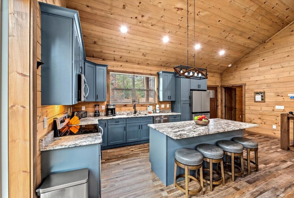 The kitchen includes pots/pans, plates, bowls, silverware, bakeware and more. There is also a dual coffee maker for both K-cups and standard coffee.
