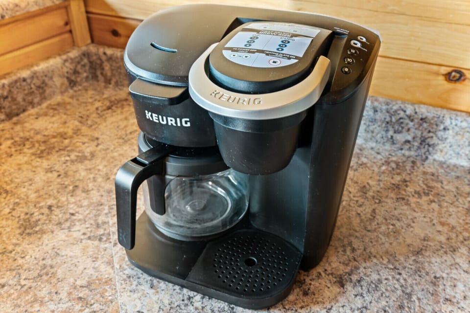 Brew a fresh cup or full pot with this dual Keurig setup—perfect for slow Smoky Mountain mornings and crisp, quiet sunrises on the deck.