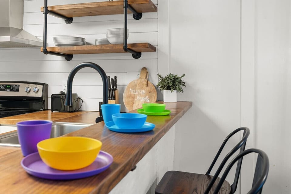 The countertop bar provides additional seating. Children`s plates and cups are also available.