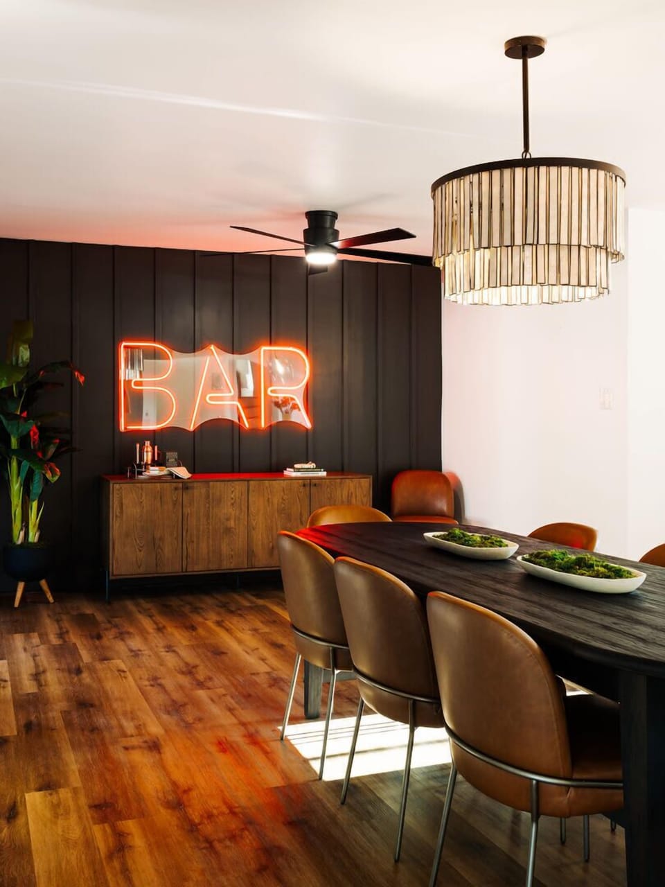 Formal dining area with seating for up to 8 and an accented bar area perfect for providing refreshments at the dinner table.