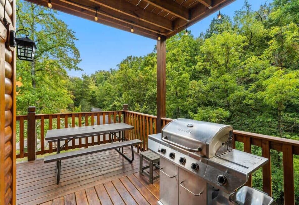 Enjoy a private, year-round heated indoor pool with 24/7 access! Perfect for families, couples, and groups, this space features a secure key door for child safety and scenic views. Relax in a climate-controlled oasis, ideal for any season. 