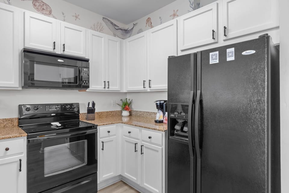 Spacious kitchen with all of the comforts of home, Refrigerator w/ Ice and water