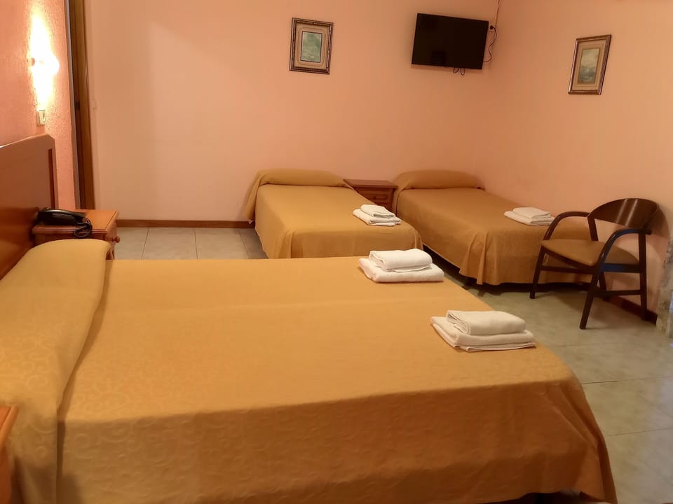 Quadruple Room, Balcony, City View | Laptop workspace, iron/ironing board, free WiFi, bed sheets