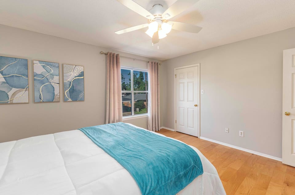 Relax and recharge in this tranquil and clean bedroom.