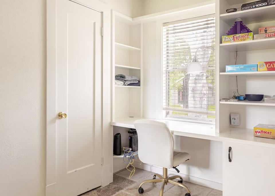Dining room desk with courtyard views—work without missing the action