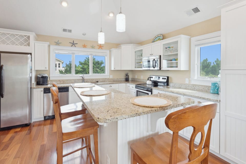 When hunger arises, the beautiful Kitchen with Granite Countertops and a Counter Island with additional seating offers a gorgeous prep space for a delicious meal that the whole family will enjoy.