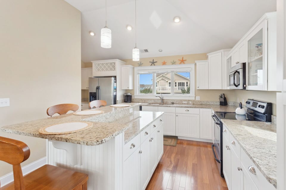 When hunger arises, the beautiful Kitchen with Granite Countertops and a Counter Island with additional seating offers a gorgeous prep space for a delicious meal that the whole family will enjoy.