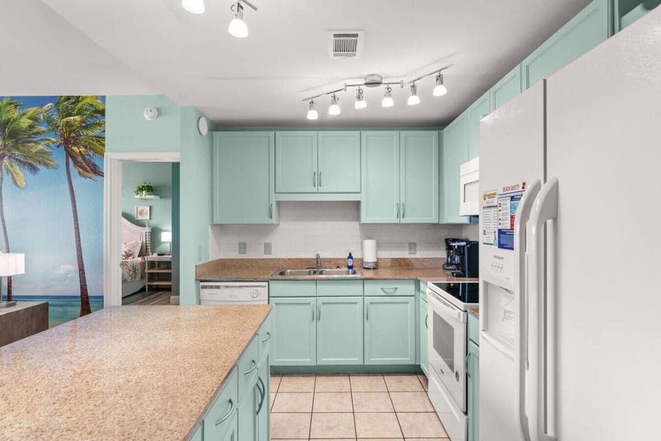 Fully Stocked Kitchen with Island Bar Seating, Lake Views, Keurig Machine and Drip Coffee Maker
