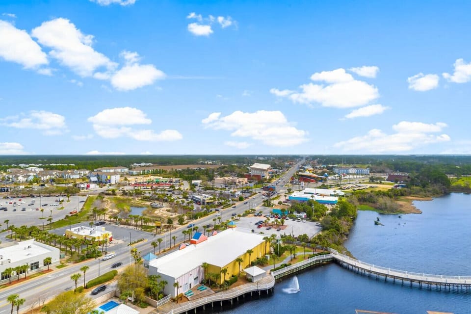 Spacious Lakefront, Furnished Balcony with Ample Seating and Nightly Light Show Views