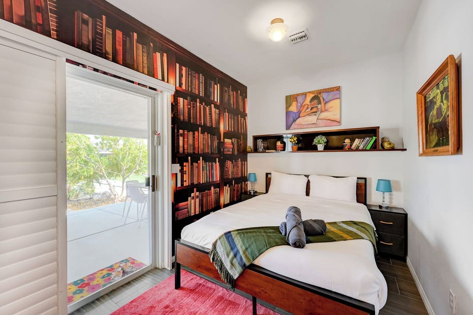 Librarian's bedroom. It has eclectic books and similar decor

