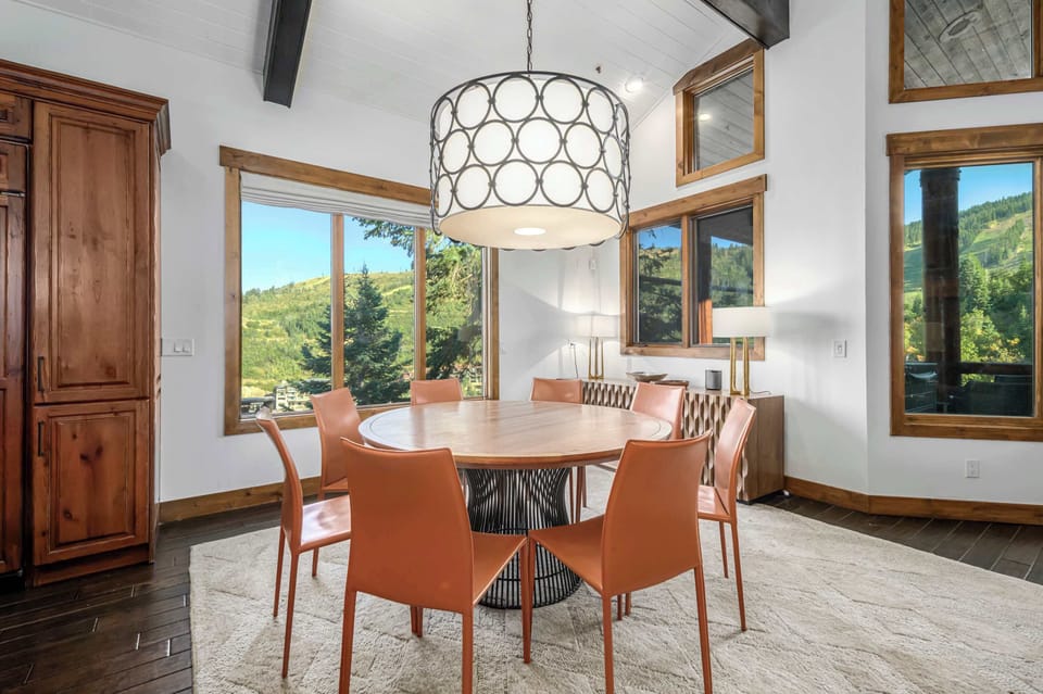 Dining Room: 8-person dining table, connected to living room and dining room