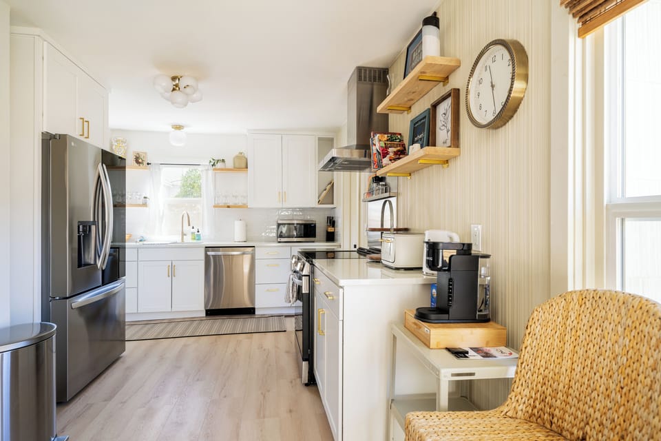 Kitchen is fully stocked with all the modern amenities you need.