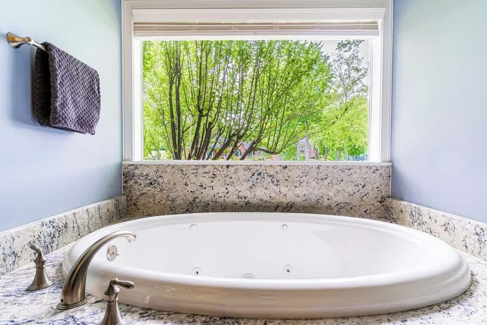 Slip into the alluring in-suite jacuzzi tub with spa jets...