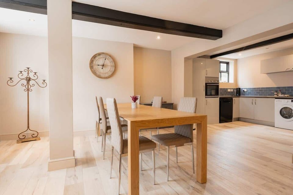 Home 2 - The Open Plan Living Space: the large dining table is perfect for hosting memorable dinners.