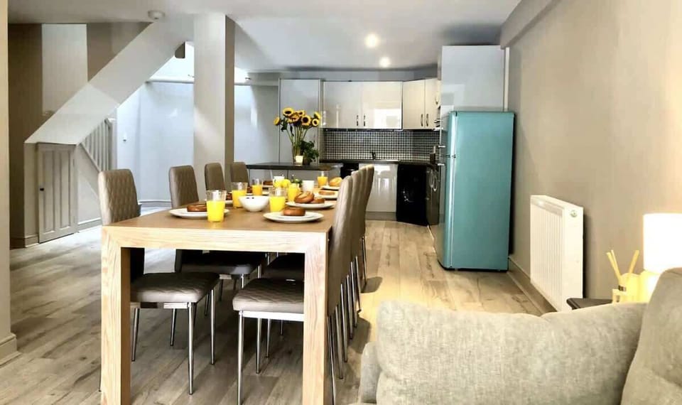 Home 1 - The Open Plan Living Space: with its modern and light décor, come together as a group to spend time together.