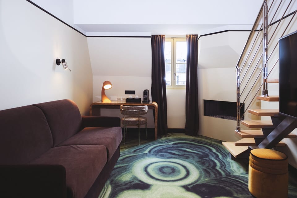 Family Suite, City View | Living area | 49-inch TV with satellite channels, pay movies