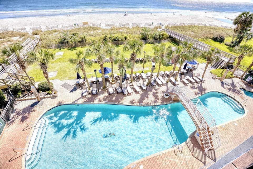 Enjoy the incredible view from your oceanfront balcony, overlooking the resort`s tropical-themed pools and lush palm trees. Beyond the pools, the golden sands of Myrtle Beach stretch out to meet the beautiful Atlantic Ocean.