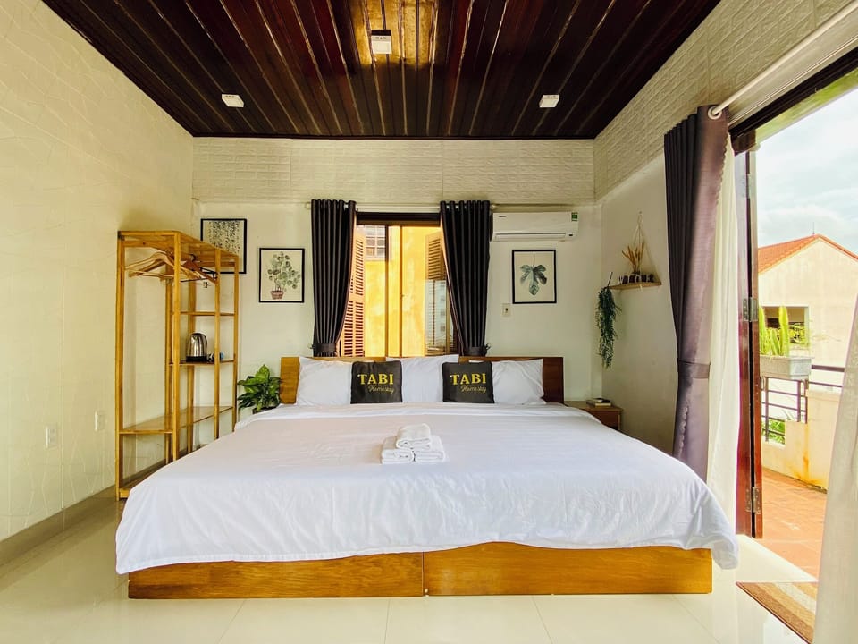 Deluxe Double Room, Balcony | Desk, laptop workspace, iron/ironing board