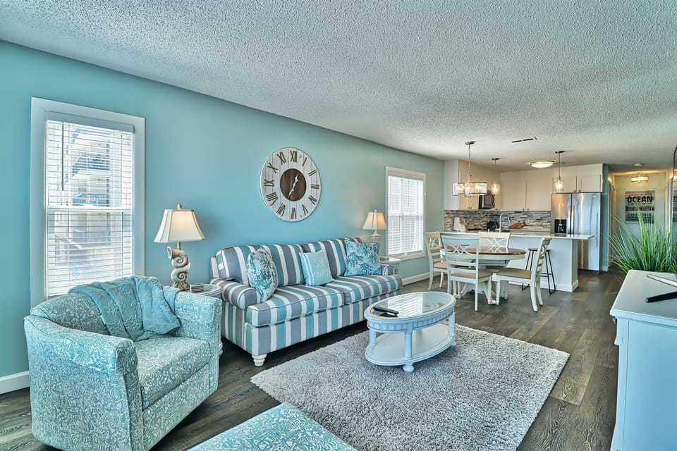 View of living room, dining area and kitchen
