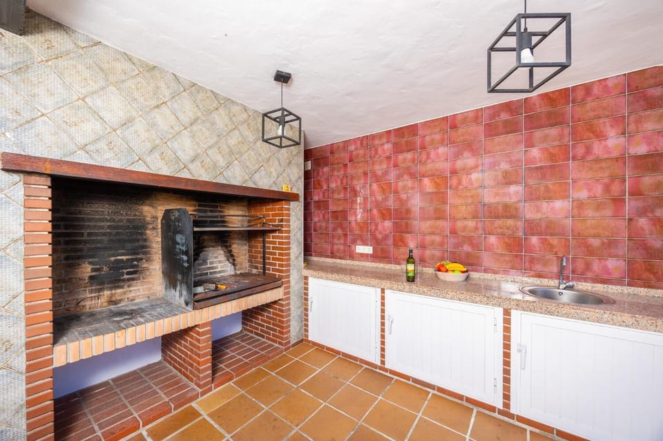 Sheltered terrace area with BBQ