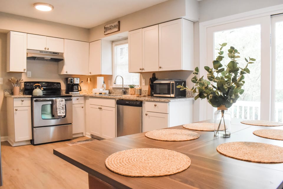 The modern kitchen is fully equipped for all your culinary needs, from preparing delicious meals to 