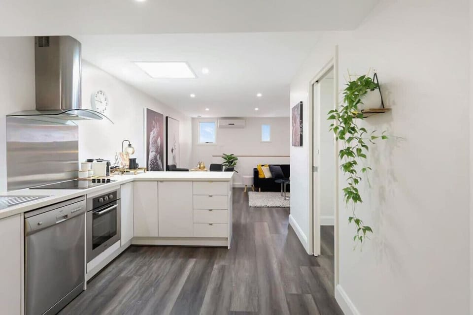 Spacious kitchen flowing into open living area