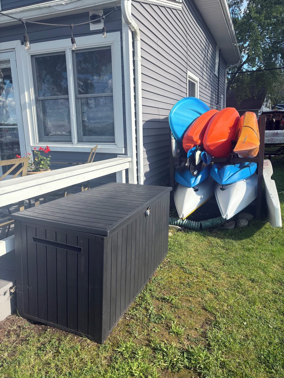Deck box with lake floats and life jackets.