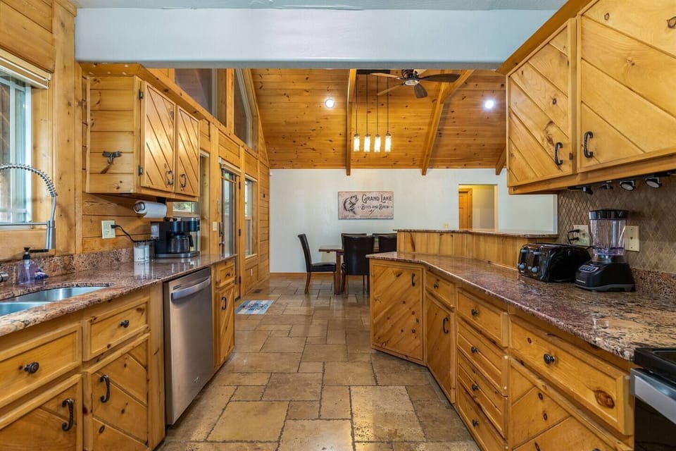 fully stocked kitchen, crock pot, blender, toaster, waffle iron, coffee, bakeware