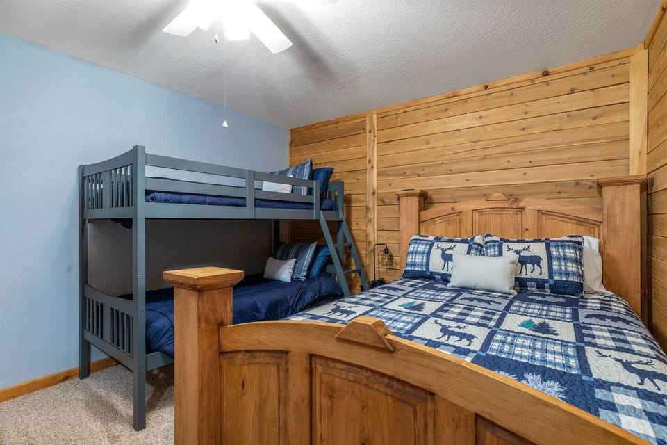 Middle Bedroom has Queen bed and Twin Bunk Beds & Smart TV