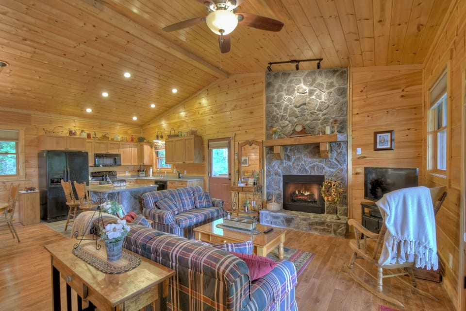 Main level living area with seasonal gas fireplace 