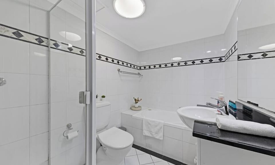 Bathroom equipped with both shower and bathtub