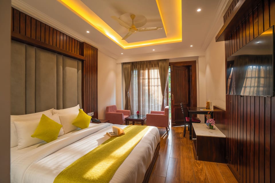 Deluxe Double Room, Balcony | Desk, laptop workspace, blackout drapes, iron/ironing board