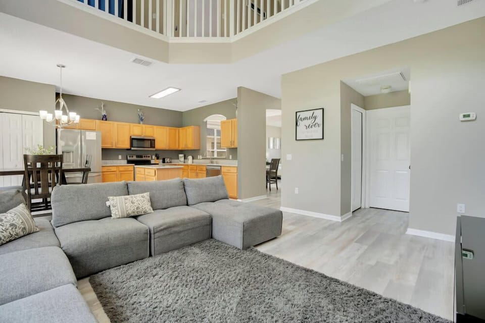 Open-concept living area with a modern kitchen and spacious seating for family gatherings.