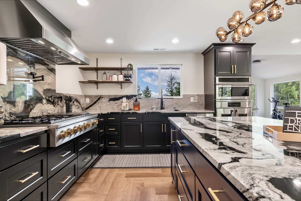 Fully-equipped kitchen featuring high-end appliances, perfect for preparing gourmet meals.