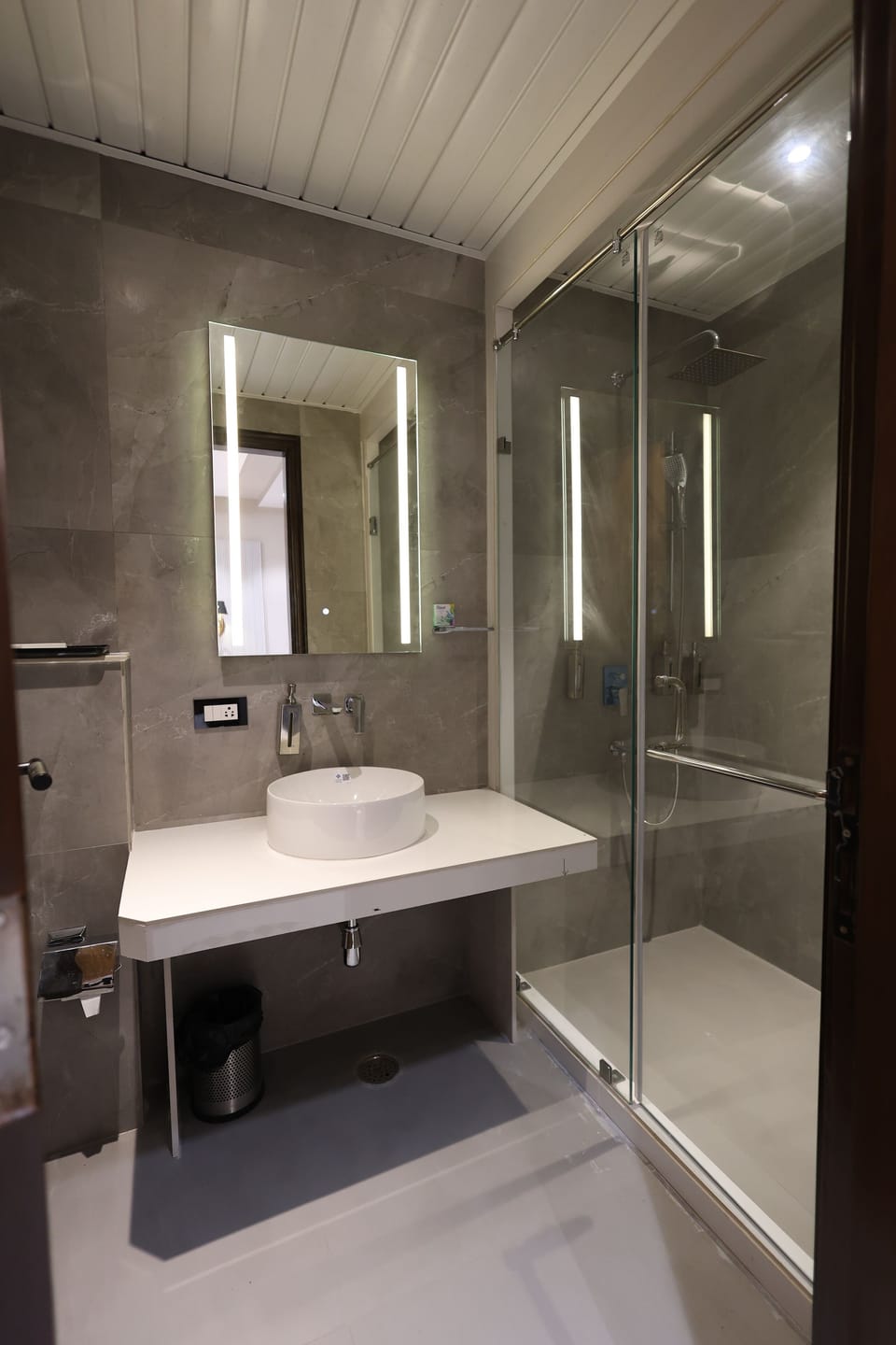 Shower, slippers, towels, soap