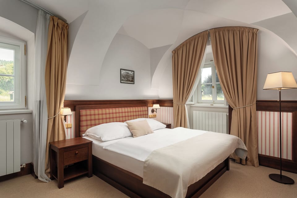 Quadruple Room, Non Smoking | Blackout drapes, free cribs/infant beds, free WiFi, bed sheets
