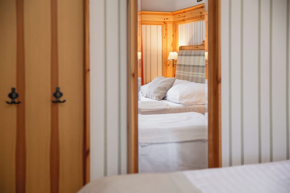 Triple Room, Non Smoking | Blackout drapes, free cribs/infant beds, free WiFi, bed sheets