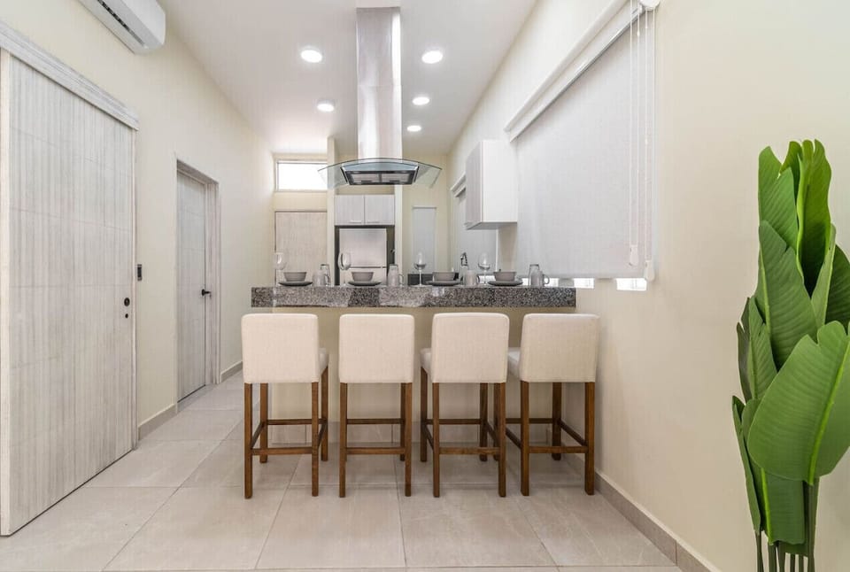 Bright and spacious kitchen and dining area, ready for family feasts or cozy dinners