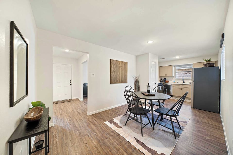 Dining Area: Bright and airy space with sleek decor, perfect for shared meals and laughter.