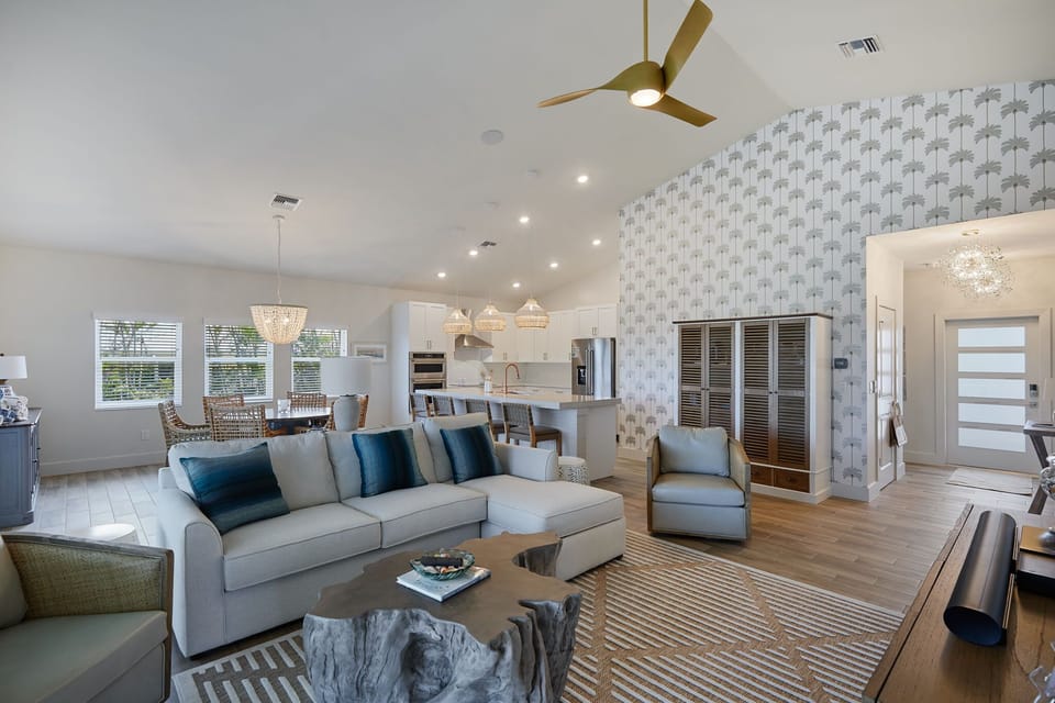 Gorgeous open floorplan new construction home with heated and caged pool