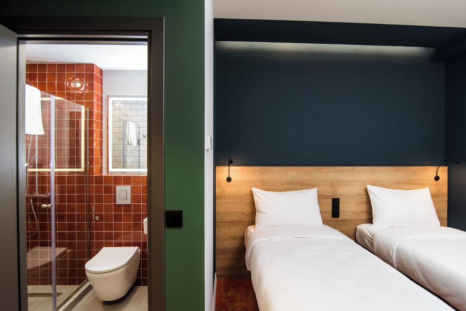 Room, 2 Twin Beds (Pop Room) | In-room safe, desk, laptop workspace, blackout drapes