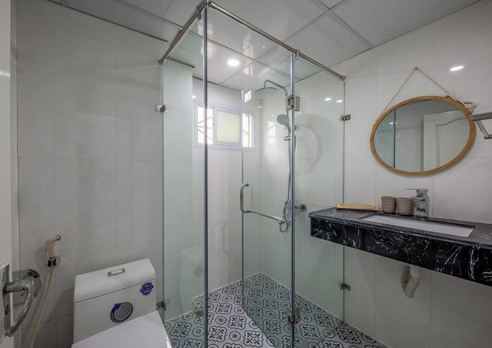 Shower, hydromassage showerhead, designer toiletries, hair dryer