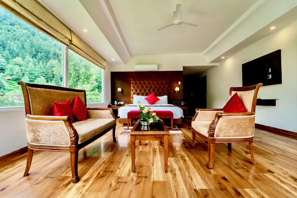 Royal Double Room, 1 King Bed, Balcony, River View | Minibar, in-room safe, individually furnished, desk