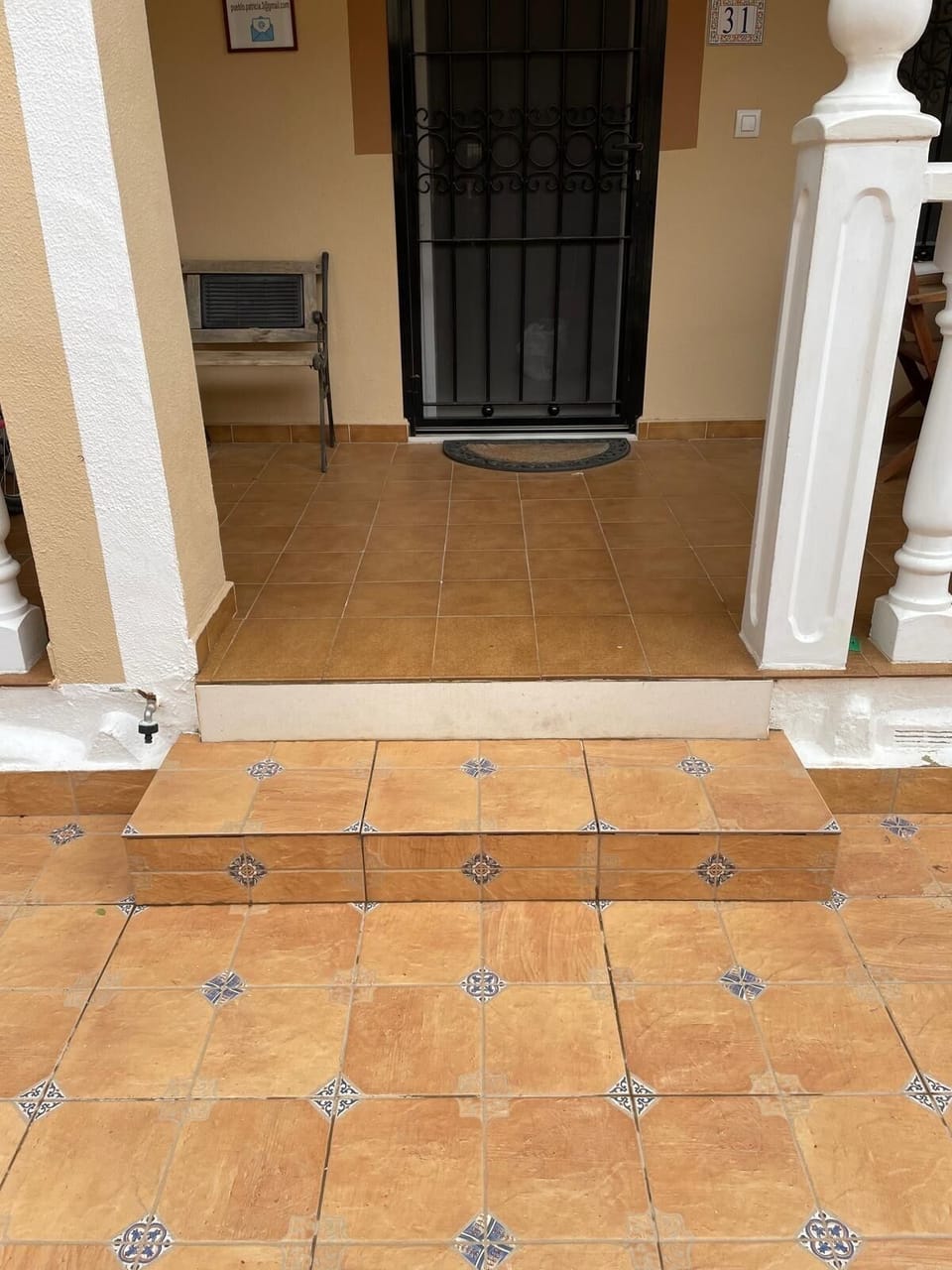 One step leading up to living room