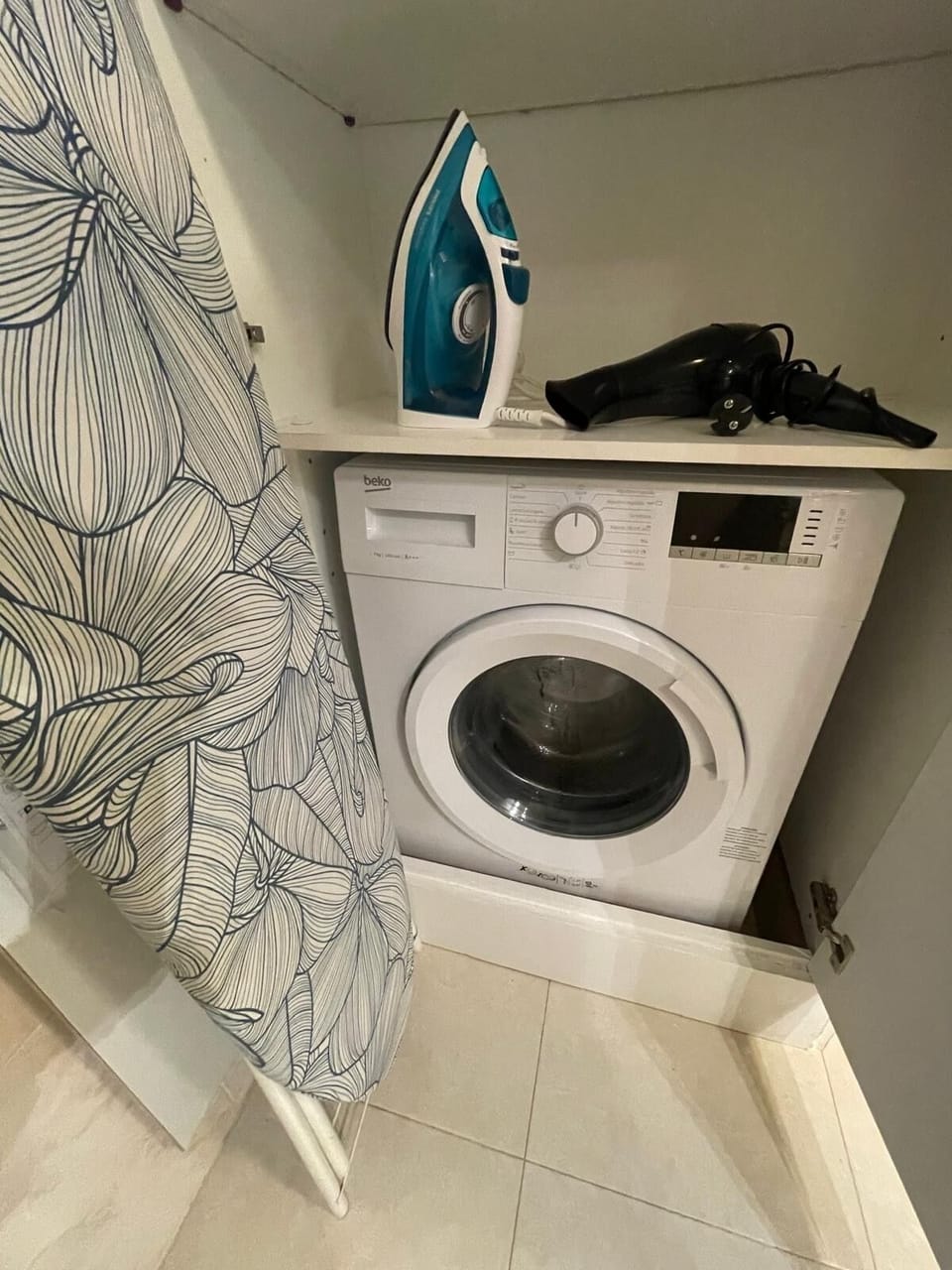 Washing machine, iron and ironing board