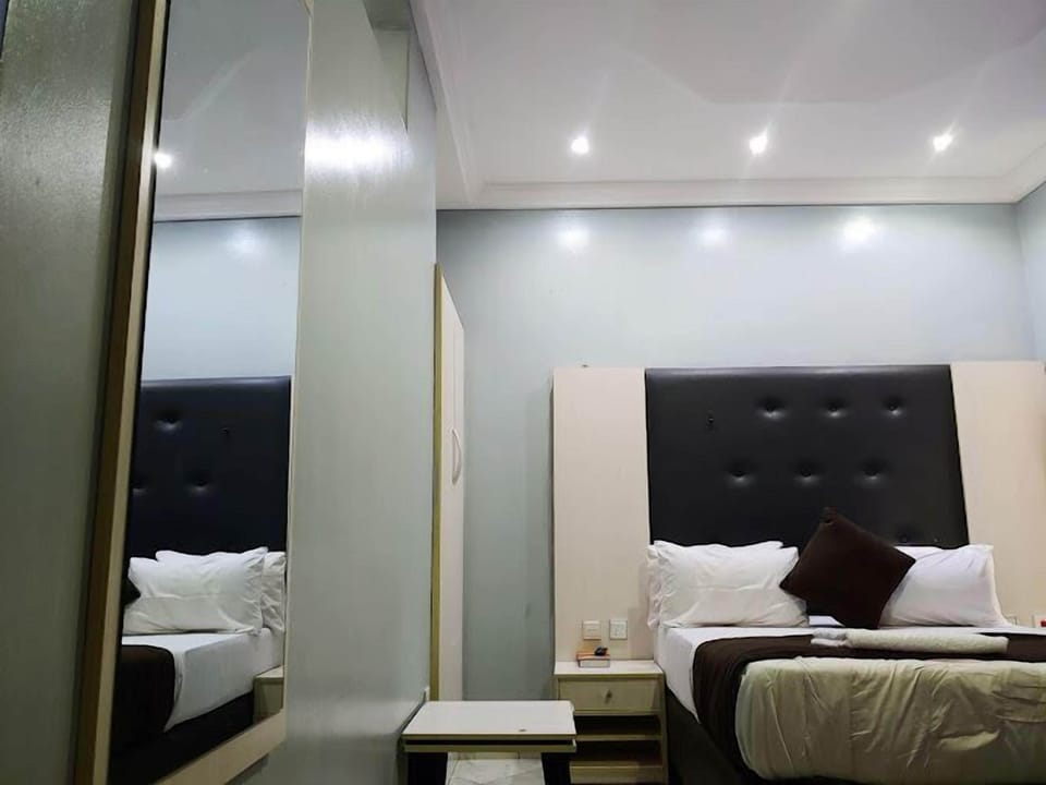 Deluxe Room, Balcony, City View | Desk, laptop workspace, free WiFi