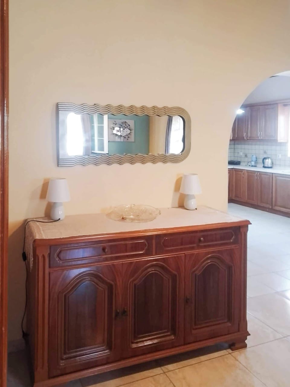 Classic Wooden Cabinet Adding Vintage Aesthetic – Traditional décor that highlights the character of the home.