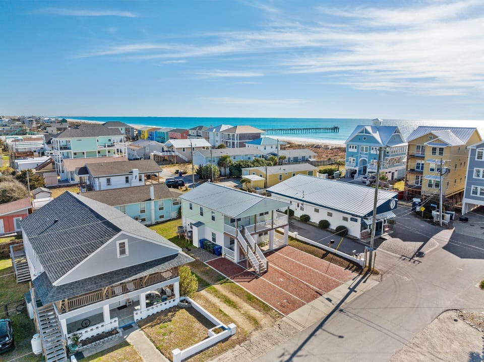 A Walk on the Beach (brick driveway) looking to the Ocean - The best restaurant in the area - Island Grille - is right next door to the right