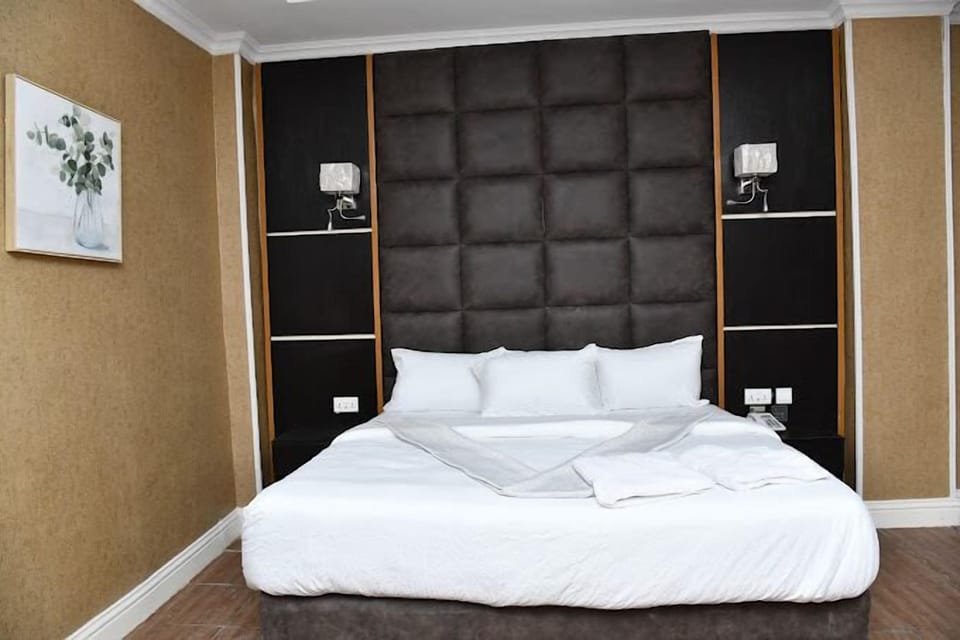 Deluxe Room, Balcony, City View | Desk, laptop workspace, free WiFi