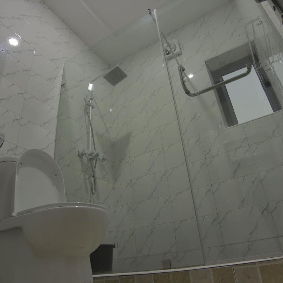 Family Room, Balcony, City View | Bathroom | Free toiletries, hair dryer, towels, soap